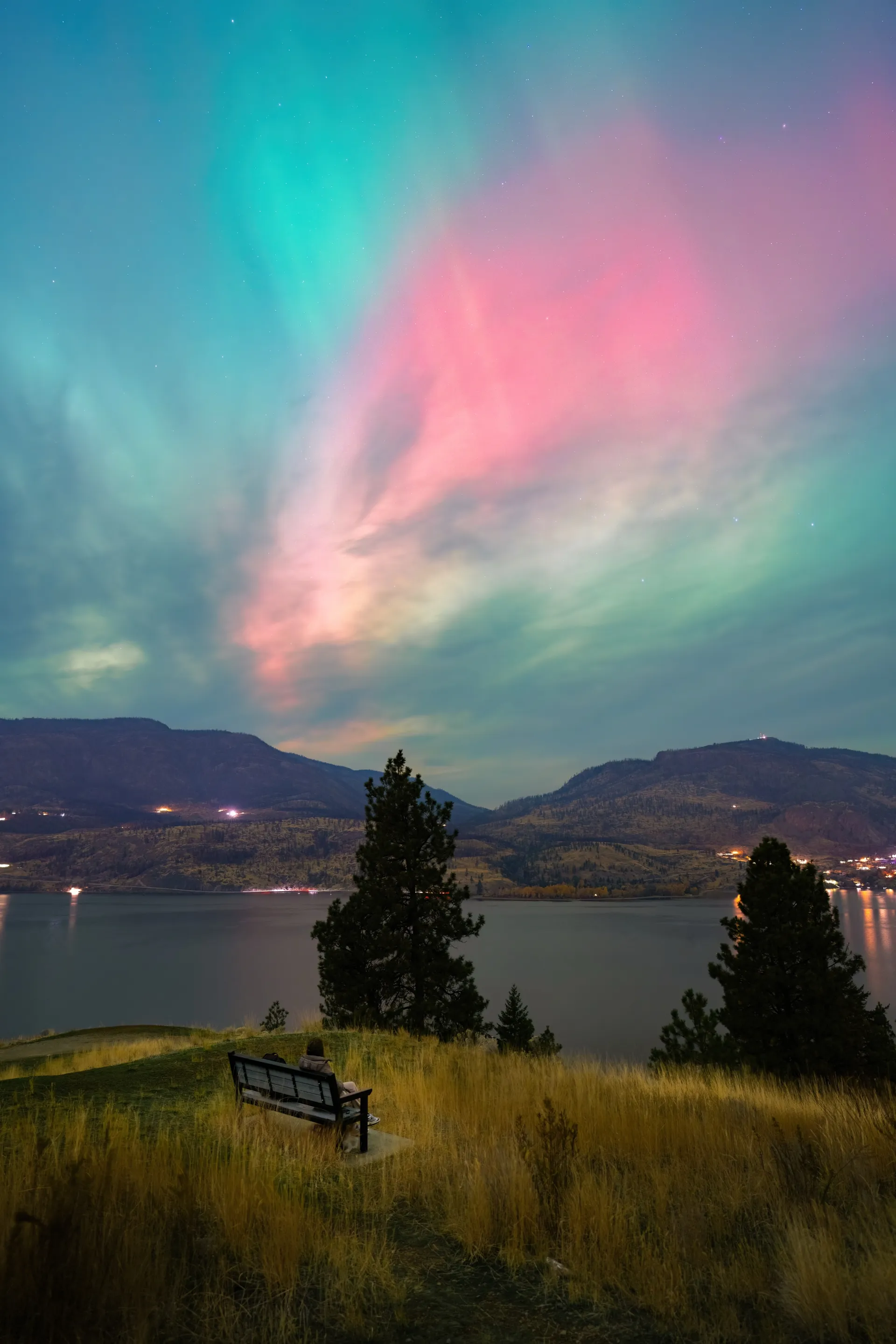Aurora borealis northern lights over Okanagan Lake Kelowna BC
